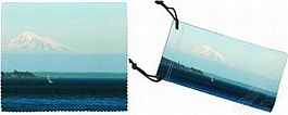 Lens cleaning cloth and pouch set displaying an ocean view with a sailboat and mountain in the background.