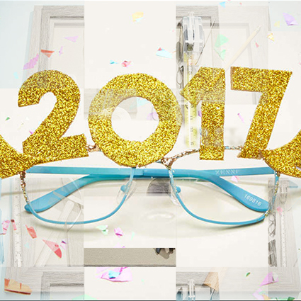 Blue glasses with glittery gold "2017" decoration on the frames.