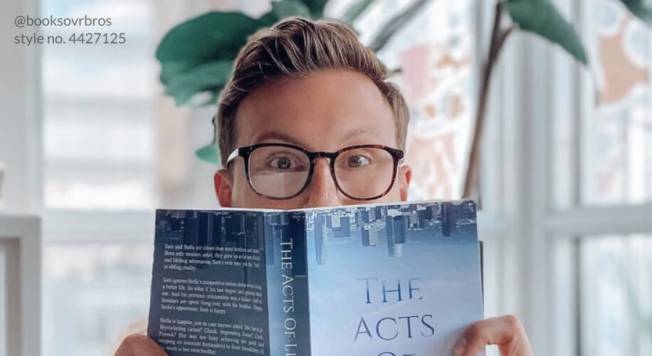 Person reading &quot;The Acts of Life&quot; book. Instagram handle: @booksovrbros style no. 4427125.