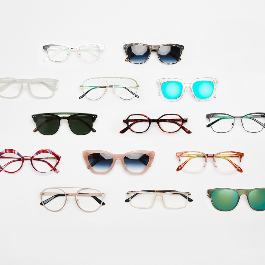 Various stylish eyeglasses and sunglasses arranged in rows on a white background.