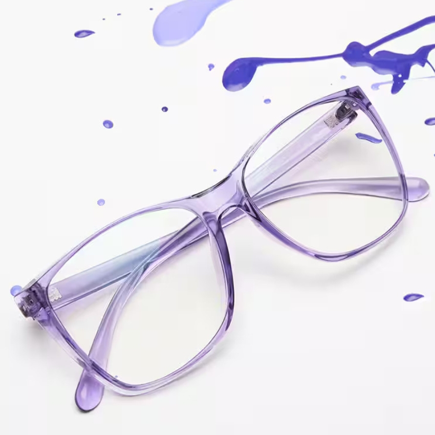 Purple framed eyeglasses with clear lenses, splattered with blue paint.