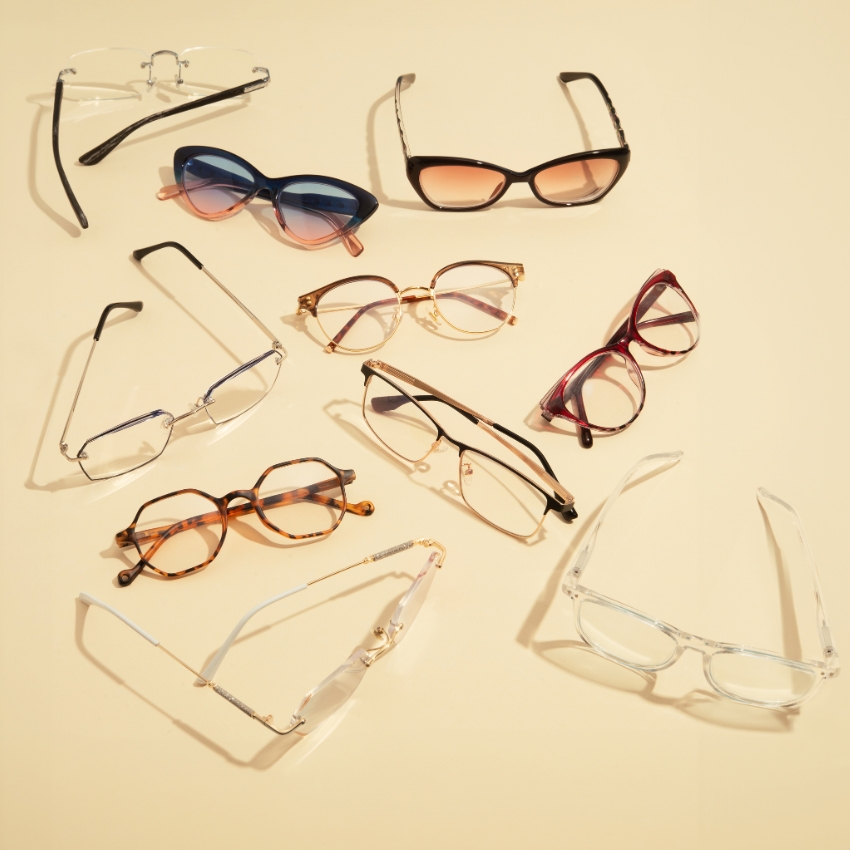 Variety of eyeglasses in different styles, including cat-eye, round, rectangular, and aviator frames.