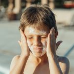 boy-wearing-sunscreen_Featured Image