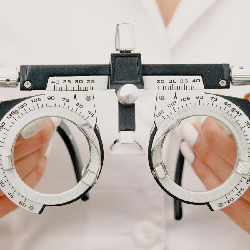 Optometry trial lenses with markings of 135 to 45 degrees and 0 to 50 diopters adjustment scale.