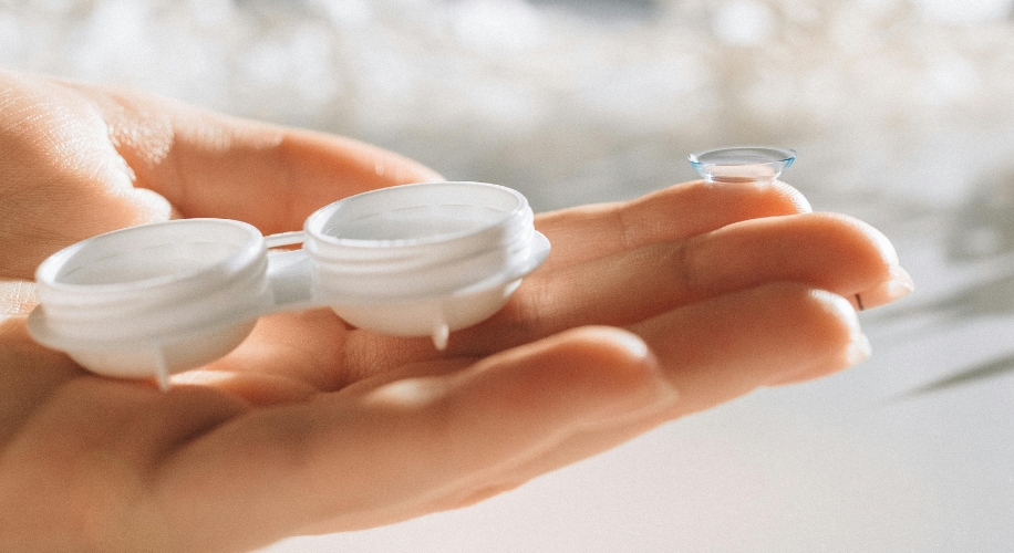 Person holding contact lens case