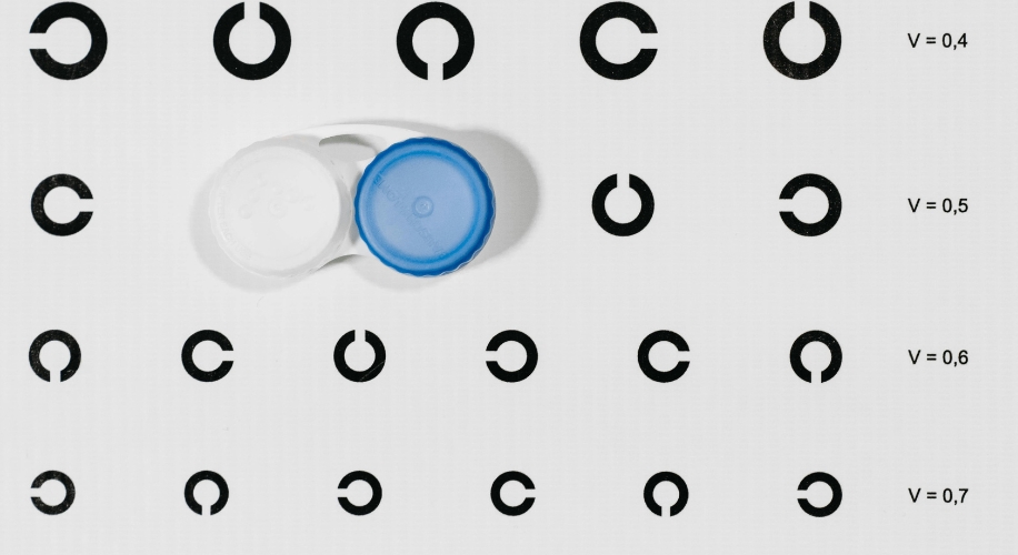 Contact lens case on eye chart