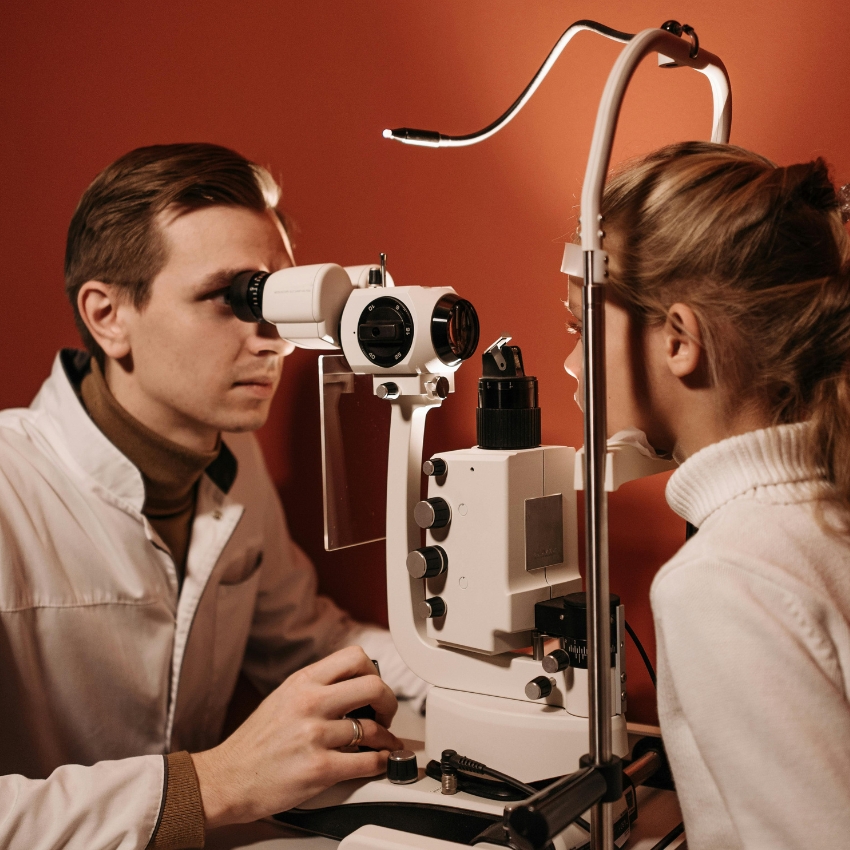 Eye examination with a slit lamp microscope.