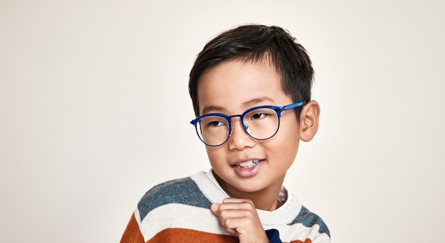 Boy wearing blue round frames