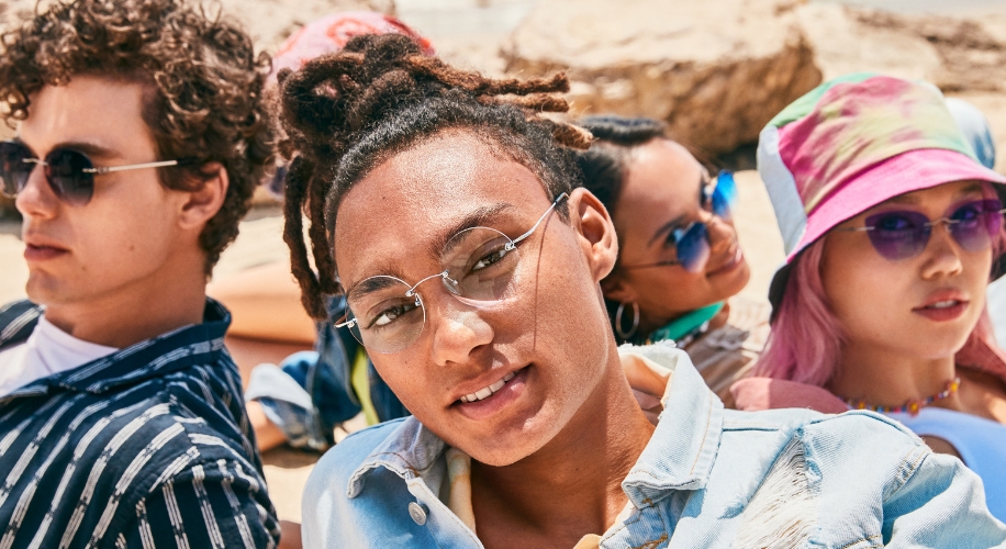 Young adults wearing stylish sunglasses.