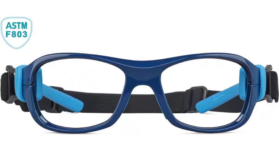 Blue protective sports goggles with a black strap and ASTM F803 certification badge on the left side.