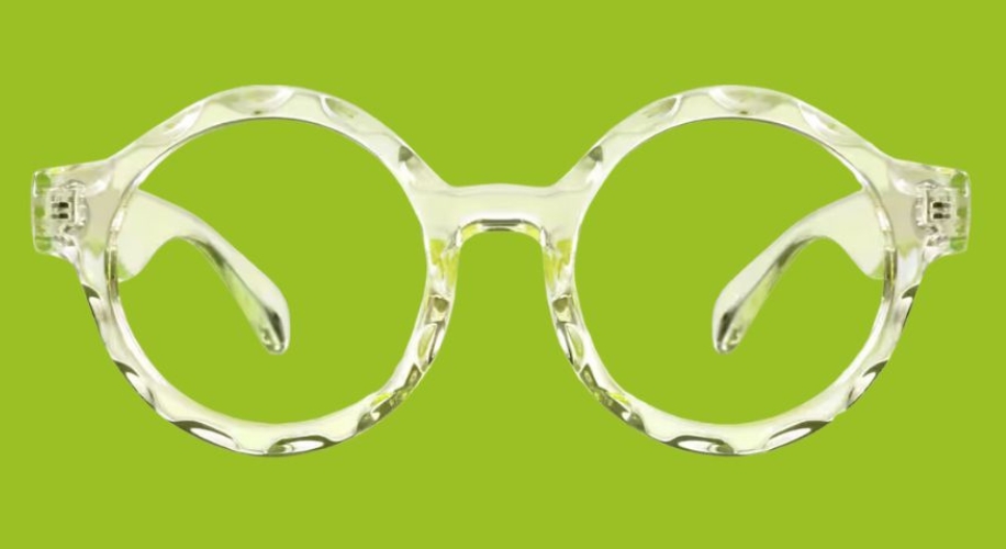 Clear round eyeglasses with a textured frame against a green background.