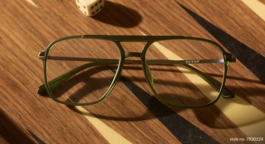 Green-framed glasses with &quot;ZENNI&quot; on the arm. Style no. 7830124.