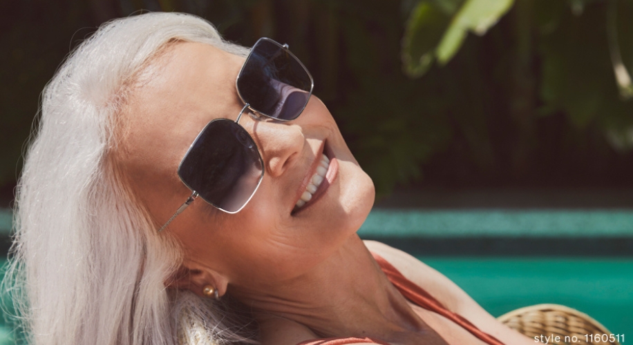 woman wearing large square sunglasses