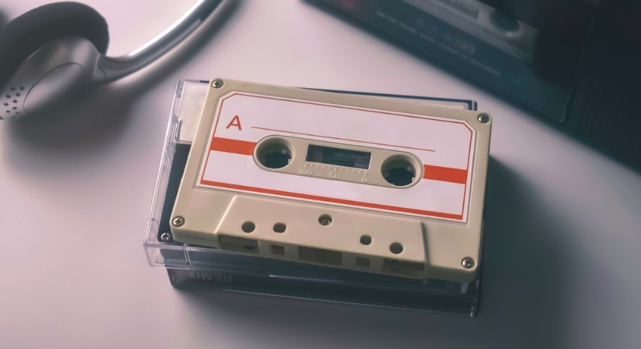 Vintage audio cassette tape labeled side A in a plastic case.