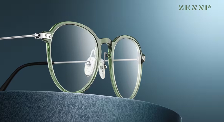 Green round eyeglass frames with clear lenses. Text in the image: ZENNI®.