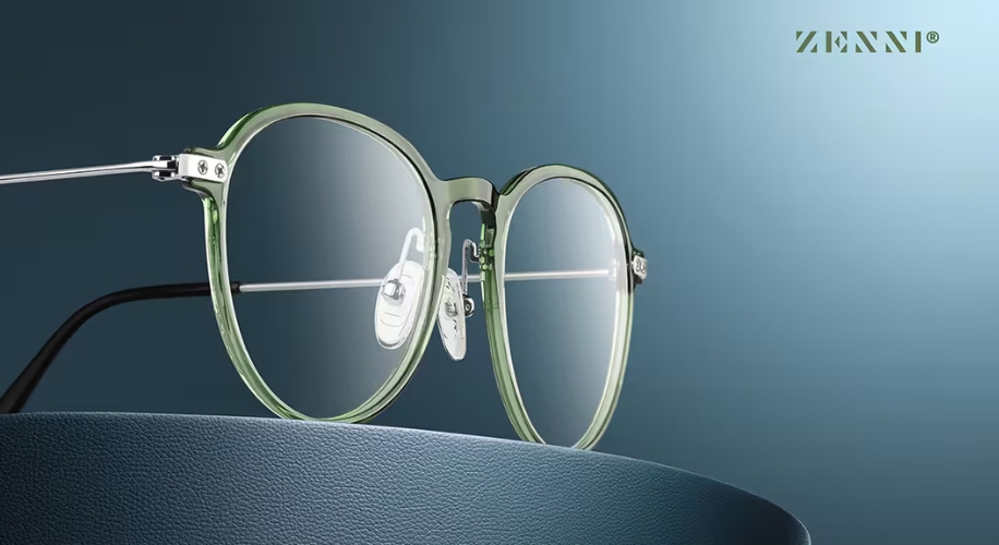 Green-framed round eyeglasses with clear lenses, Zenni logo in the top right corner.