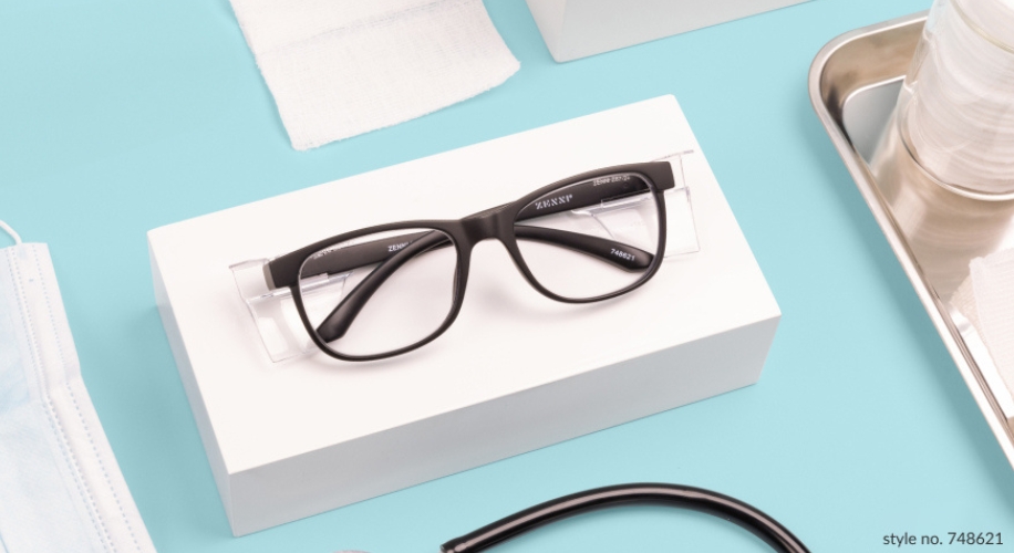 Black rectangular eyeglasses on white display with style no. 748621.