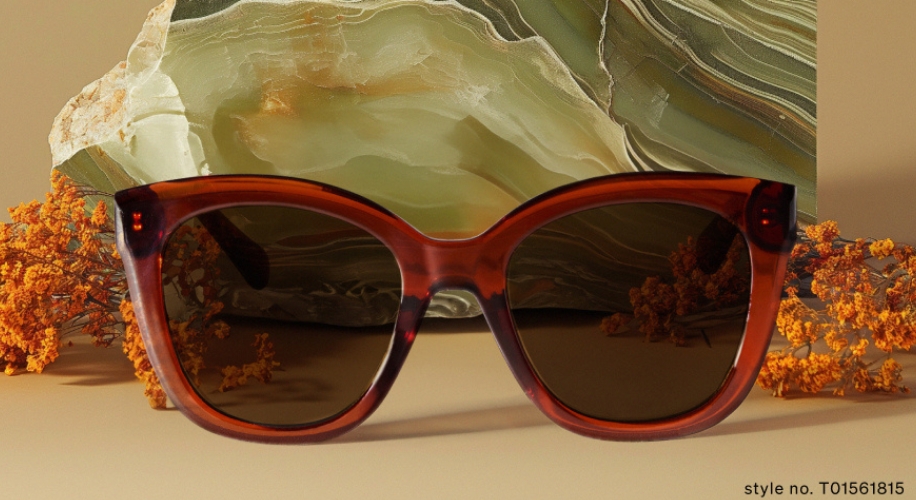 Brown sunglasses with dark lenses. The text &quot;style no. T01561815&quot; is in the bottom right corner.