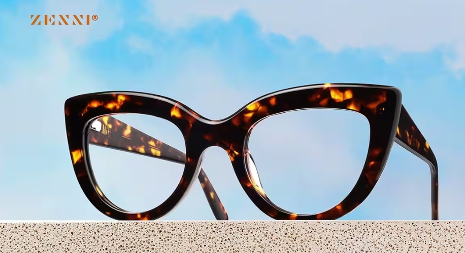 Tortoise shell cat-eye eyeglasses with thick frames. Text: ZENNI®