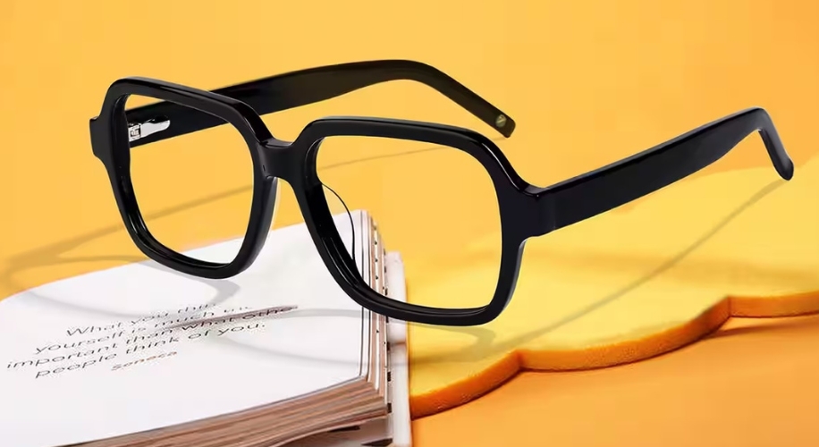 Black rectangular eyeglasses on an open book. &quot;What you think about yourself is more important than what people think of you.&quot;