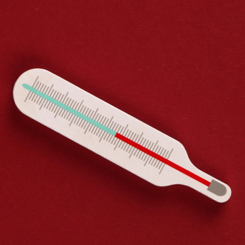 Cartoon-style thermometer with a red and green temperature bar on a red background.