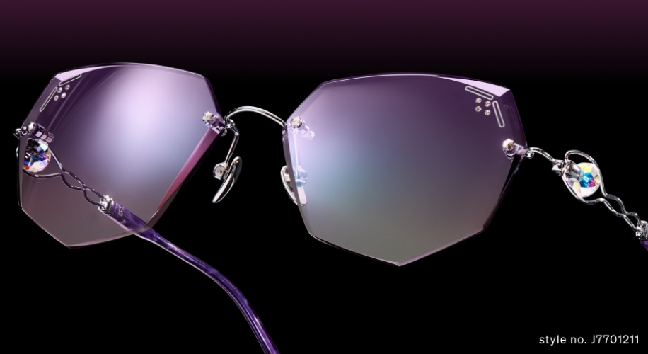 Stylish rimless purple sunglasses, hexagon-shaped lenses, and ornate side chains. Style no. J7701211.