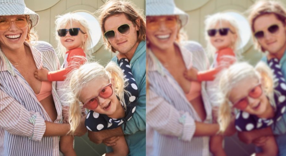 Family in stylish sunglasses, white hats, and casual beachwear, smiling and enjoying a sunny day together.