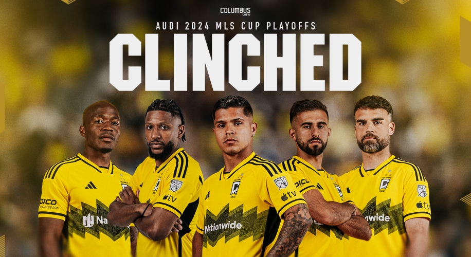 Columbus Crew players celebrating: &quot;Audi 2024 MLS Cup Playoffs Clinched&quot;.