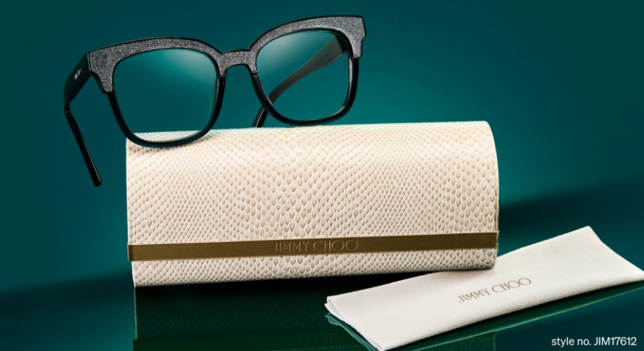 Black glasses with a white patterned case and cloth, Jimmy Choo branding. Style no. JIM17612.