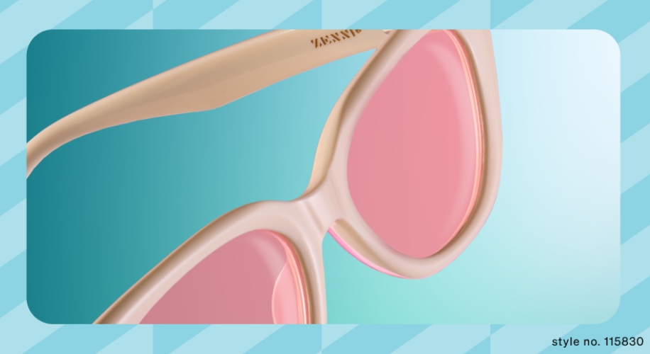 Beige sunglasses with pink lenses, style no. 115830. Brand name on the temple.