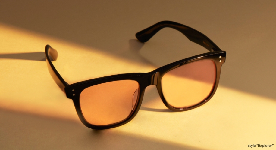 Black sunglasses with orange lenses, style &quot;Explorer&quot;.