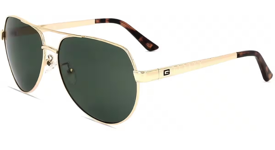 Gold-framed aviator sunglasses with dark lenses and logo on the arm.