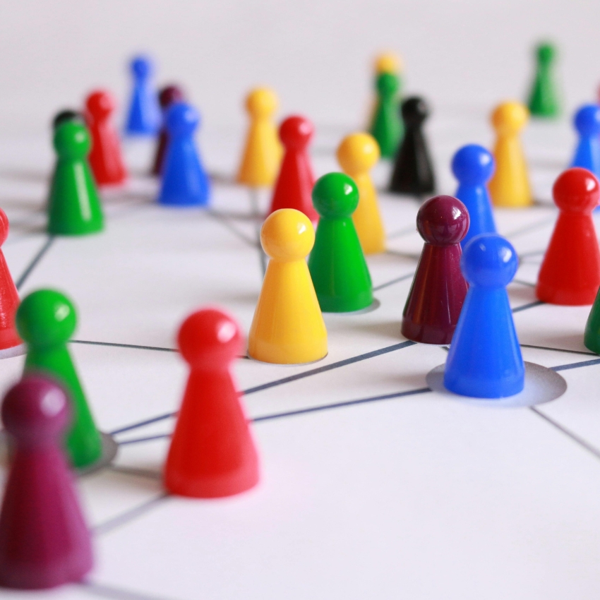 Colorful game pieces on a connected network.